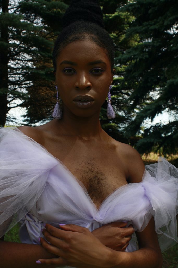 Esther Queen Esie Calixte-Bea on Embracing Black Beauty and Pushing  Against Societal Ideals